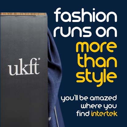 A piece of blue fabric behind a panel labeled UKFT