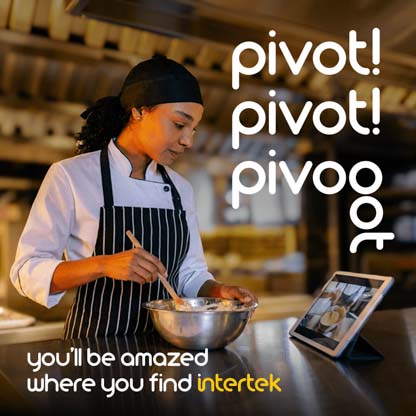 A chef stirring ingredients in a bowl while viewing training content on a digital tablet